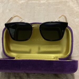 Gucci Black and Gold Sunglasses
